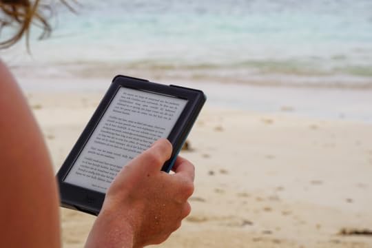 woman reader on a beach