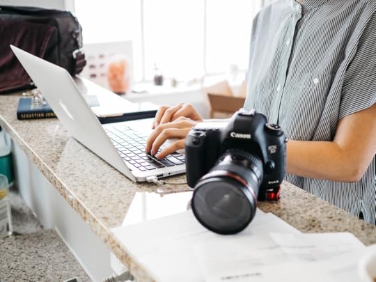 creating an engaging social media post on laptop