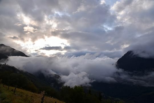 Mountains with low, thick clouds amongst them