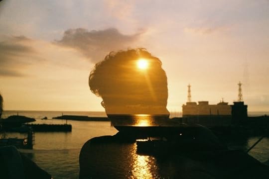 Silhouette of a person's head with the sun behind it. Feeling this way in my head.