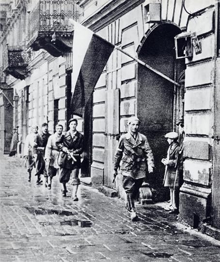 Polish insurgent fighter Lt. Stanislaw Jankowski and his men right before the start of the Warsaw Uprising, Warsaw, Poland, 1 Aug 1944 (public domain via Wikipedia)