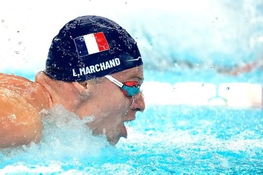 Leon Marchand, of France, competes in the men's 200-meter individual medley at the 2024 Summer Olympics, Thursday, Aug. 1, 2024, in Nanterre, France. (AP Photo/Ashley Landis)