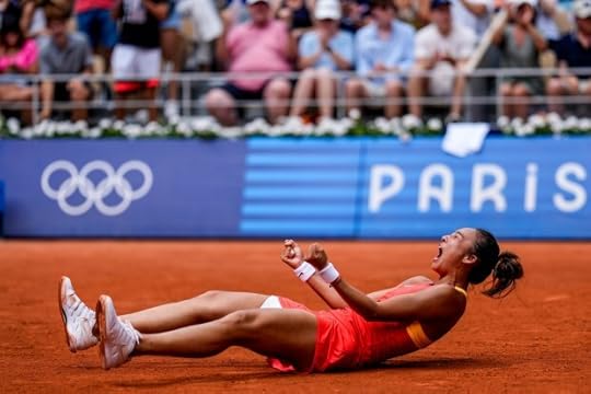 Qinwen Zheng of China celebrates her victory over Iga Swiatek of Poland during their women's semifinals match at the Roland Garros stadium, at the 2024 Summer Olympics, Thursday, Aug. 1, 2024, in Paris, France. (AP Photo/Manu Fernandez)