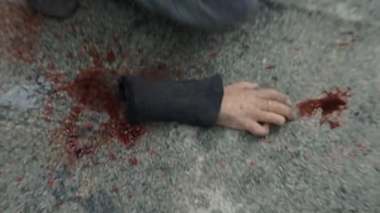 A severed bloody arm on the ground on House of the Dragon