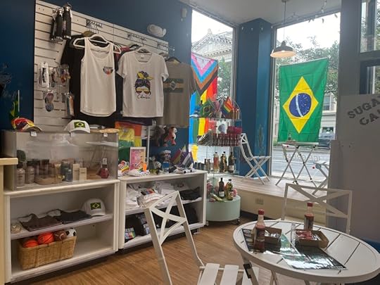 Cafe interior with gay pride and Brazilian flags