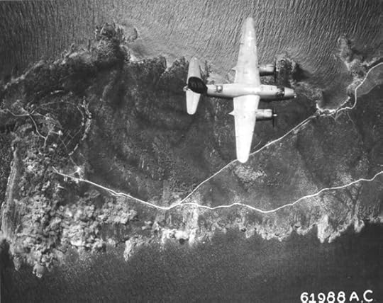 B-26B Marauder of the 441st Bomb Squadron (US Twelfth Air Force) over Île du Levant, France south of St. Tropez on raid to bomb gun installations, 4 Aug 1944 (US National Archives: 61988 AC)