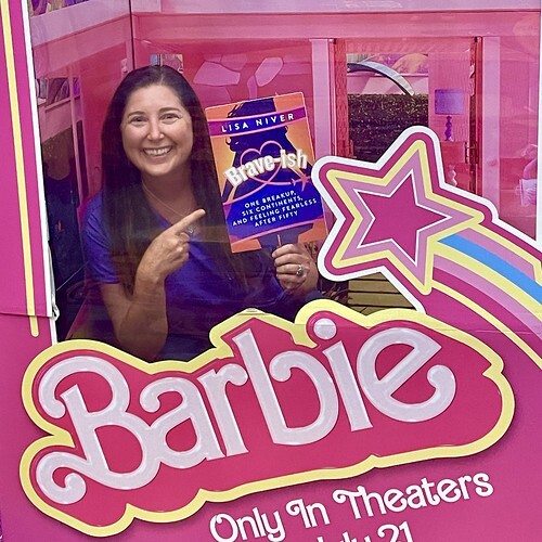 Lisa Niver with Brave-ish cover in a Barbie photoshoot