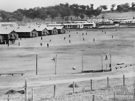 Japanese prisoners of war practicing baseball at No.12 Prisoner of War compound near Cowra, NSW, Australia, 1 Jul 1944 (Australian War Memorial: 067168)