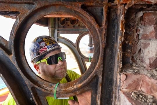 JP Pelletier, site superintendent for the Pigeon Point Lighthouse restoration project, shows the condition of iron and brick near the top of the 115-foot-tall landmark on the San Mateo County coast, Thursday, Aug. 1, 2024. (Karl Mondon/ Bay Area News Group)