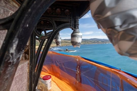 Sharp points on the ironwork of the Pigeon Point Lighthouse are wrapped in protective coverings near the top of the 115-foot-tall landmark on the San Mateo County coast, Thursday, Aug. 1, 2024. (Karl Mondon/ Bay Area News Group)