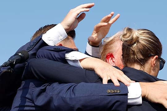 Republican presidential candidate former President Donald Trump is rushed offstage...