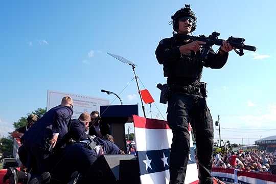 Republican presidential candidate former President Donald Trump is covered by...