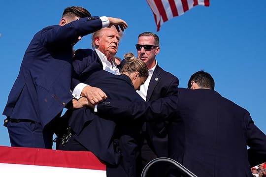 Republican presidential candidate former President Donald Trump is surround by...
