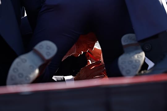Republican presidential candidate former President Donald Trump is rushed offstage...