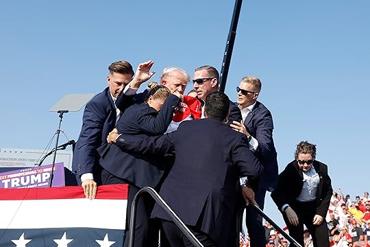 Republican presidential candidate former President Donald Trump is rushed offstage...