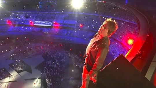 Tom Cruise standing on top of the Stade de Paris during the 2024 Summer Olympics closing ceremony