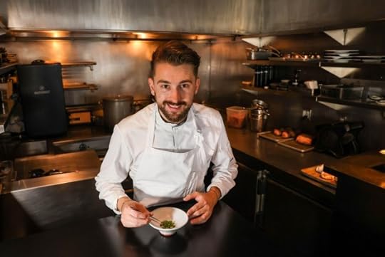 The San Francisco restaurant was elevated to two-star status at Monday night's Michelin Guide International ceremony in Half Moon Bay. Above, executive chef Harrison Cheney prepares a sprouted and toasted buckwheat with chanterelles and summer stems dish at the restaurant in Sept. 2023. (Ray Chavez/Bay Area News Group archives)