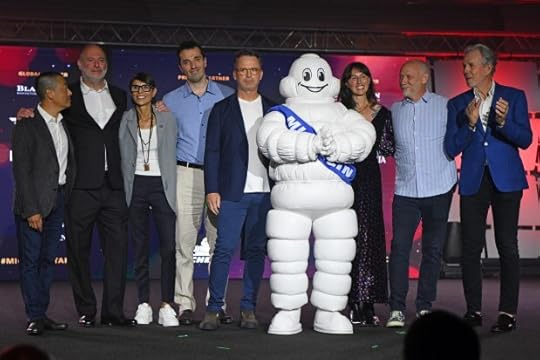 Chefs retaining their three-star Michelin stars come on stage to pose for a photograph with the Michelin man during the Michelin Guide Ceremony California 2024 awards at the Ritz Carlton in Half Moon Bay, Calif., on Monday, Aug. 5, 2024. (Jose Carlos Fajardo/Bay Area News Group)