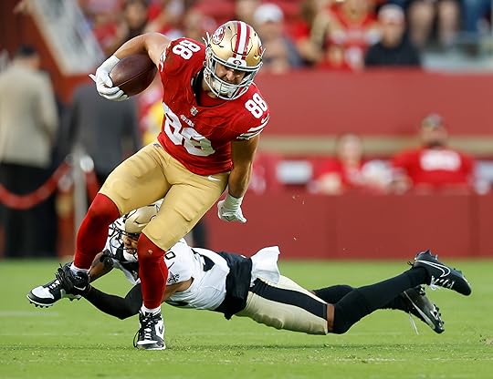 San Francisco 49ers’ Jake Tonges (88) is tackled after a...