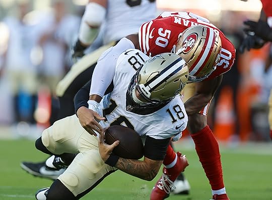 San Francisco 49ers’ Jalen Graham (50) sacks New Orleans Saints’...