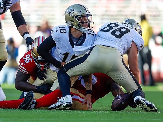 San Francisco 49ers’ T.Y. McGill Jr. (96) forces a fumble...