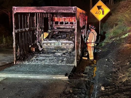 A fire caught inside a vehicle trailer Sunday, spreading to nearby vegetation. Though the trailer sustained minor damage, the 1979 Ford Ghia Probe 1 concept car is totaled. (Photo courtesy of the Monterey Fire Department)