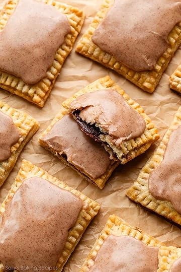 homemade brown sugar pop tart broken in half to show cinnamon filling.