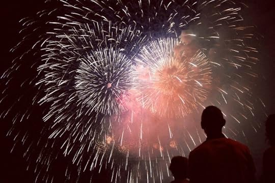 Two people in silhouette before fireworks. Just be you.