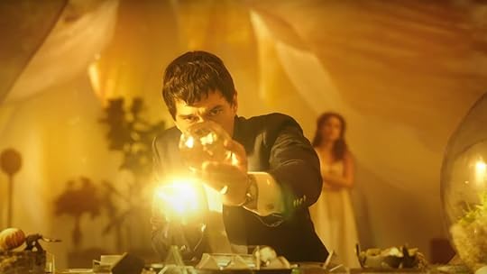 image from megalopolis trailer of adam driver in front of a golden orb