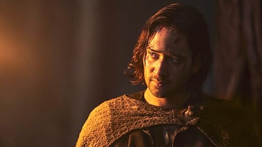 Maxim Baldry as Isildur by torch at night on The Rings of Power