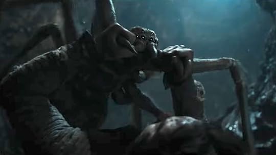 A young, much smaller Shelob attacks a human on The Rings of Power
