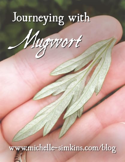 a hand holding a mugwort leaf with the words 
