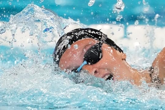 Summer McIntosh, of Canada, competes during a heat in the women's 400-meter freestyle at the 2024 Summer Olympics, Saturday, July 27, 2024, in Nanterre, France. (AP Photo/Matthias Schrader)