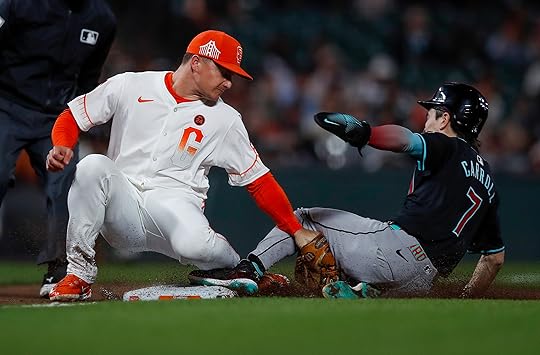 Arizona Diamondbacks’ Corbin Carroll (7) steals second base against San...