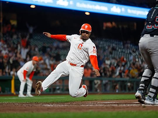 San Francisco Giants’ LaMonte Wade Jr. (31) scores a run...