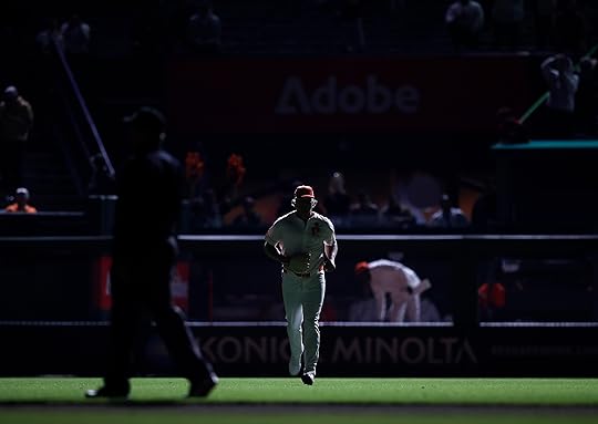 San Francisco Giants’ Erik Miller (68) heads onto the field...