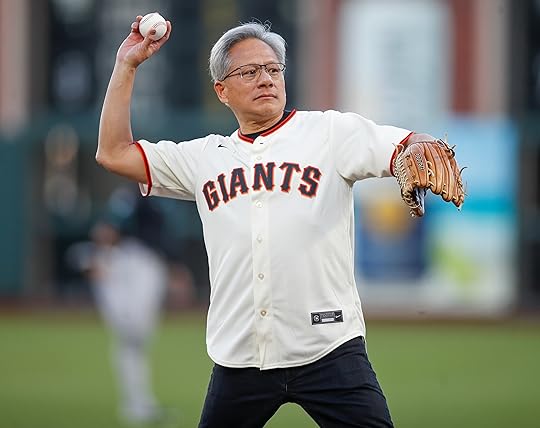 NVIDIA CEO Jensen Huang throws out the first pitch before...