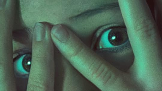 image from wolf man teaser trailer of a girl peeking through her fingers