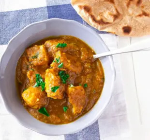 butter chicken met naan