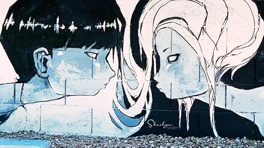 wall art man woman face to face employee feedback