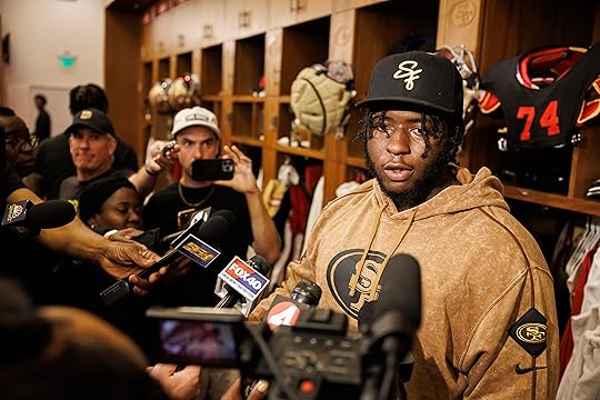 San Francisco 49ers guard Spencer Burford speaks in the locker...