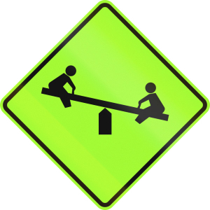 warning ign showing children on a teeter totter