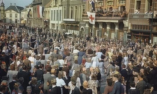 People of Eindhoven, the Netherlands, dance in the town square after liberation, 20 Sept 1944 (Imperial War Museum 4905-03 TR 2369)