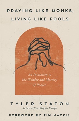 Book cover. Hand-drawn illustration of hands clasped in prayer. Title: Praying Like Monks, Living Like Fools, by Tyler Staton.