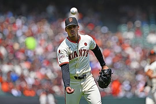 San Francisco Giants pitcher Randy Rodríguez (73) tosses the ball...