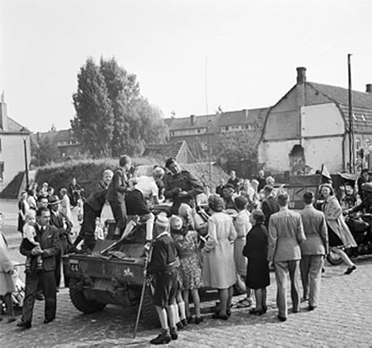 Men of the Guards Armoured Division of the British XXX Corps passing through Grave, the Netherlands, 19 Sept 1944 (Imperial War Museum 4700-29 B 10133)