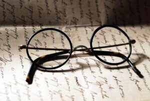 Picture of Harry Potter glasses on a page of handwritten text