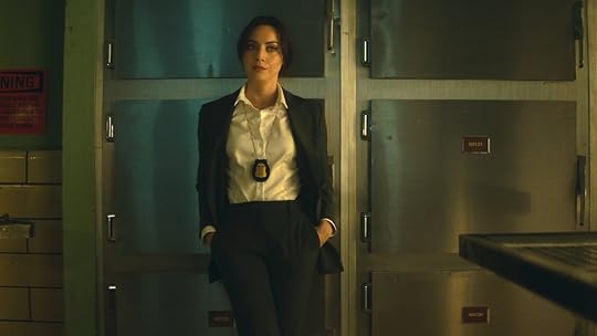 Aubrey Plaza dressed as a cop in a morgue on Agatha All Along
