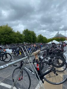 Row of bikes racked under a cloudy sky