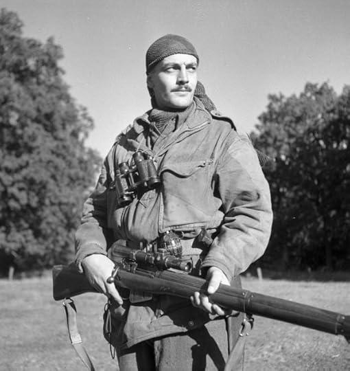 Canadian Calgary Highlanders Sniping Platoon Sergeant Harold A. Marshall posing with his Lee-Enfield No. 4 Mk. I rifle, Kapellen, Belgium, 6 Oct 1944 (Library and Archives Canada: 3206370)